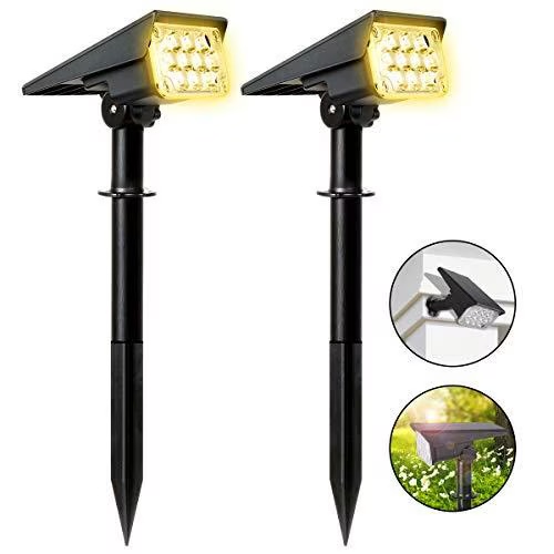 Lampa de perete solara reglabila - utilizare practica in gradina, montata pe un gard din lemn